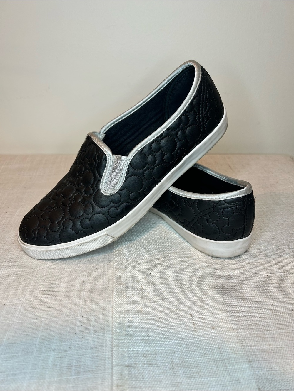 Disney Parks Black faux leather Quilted Slip-On Sneakers with Silver Trim